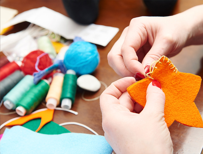 Students learning to sew and textiles